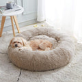 Calming donut cuddler pet bed