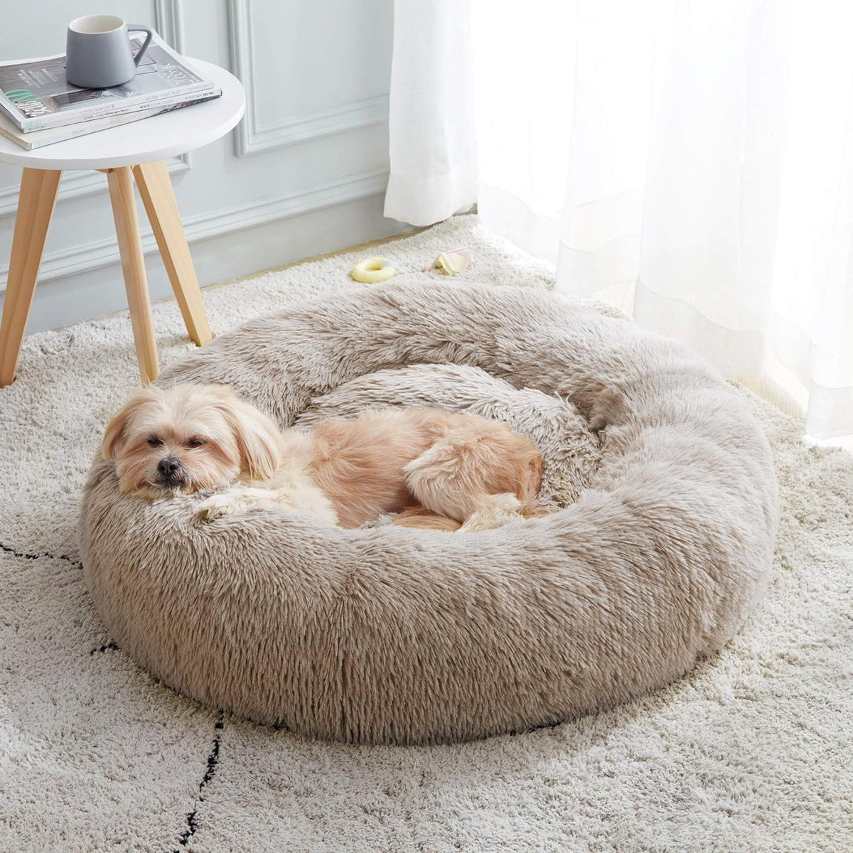 Calming donut cuddler pet bed